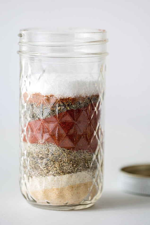 Glass jar with layered spices