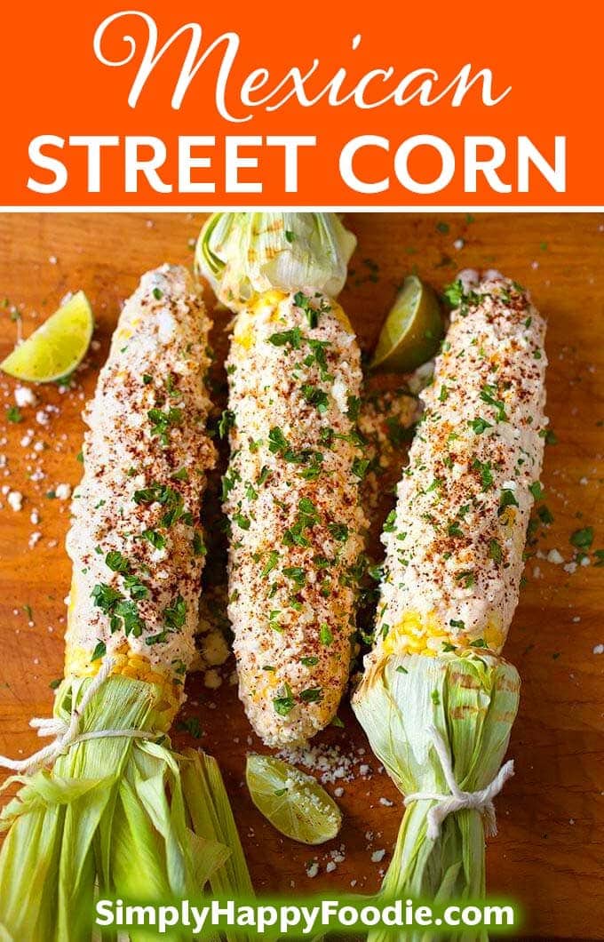 Mexican Street Corn (Elotes) is lightly grilled corn on the cob slathered with a creamy, spicy cheese mixture. Grilled corn on the cob that is super flavorful! simplyhappyfoodie.com #mexicanstreetcorn #cornonthecob #elotes #grilledcornonthecob