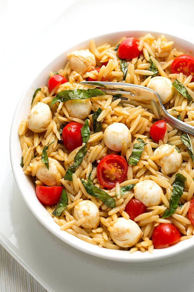 Caprese Orzo Salad in a white bowl