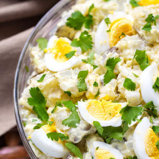 Easy Instant Pot Potato Salad is tasty and simple. Potatoes and eggs cook together! simplyhappyfoodie.com #instantpotrecipes #instantpotpotatosalad
