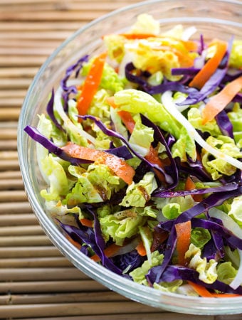 Bowl of Fresh Asian Slaw on a bamboo mat