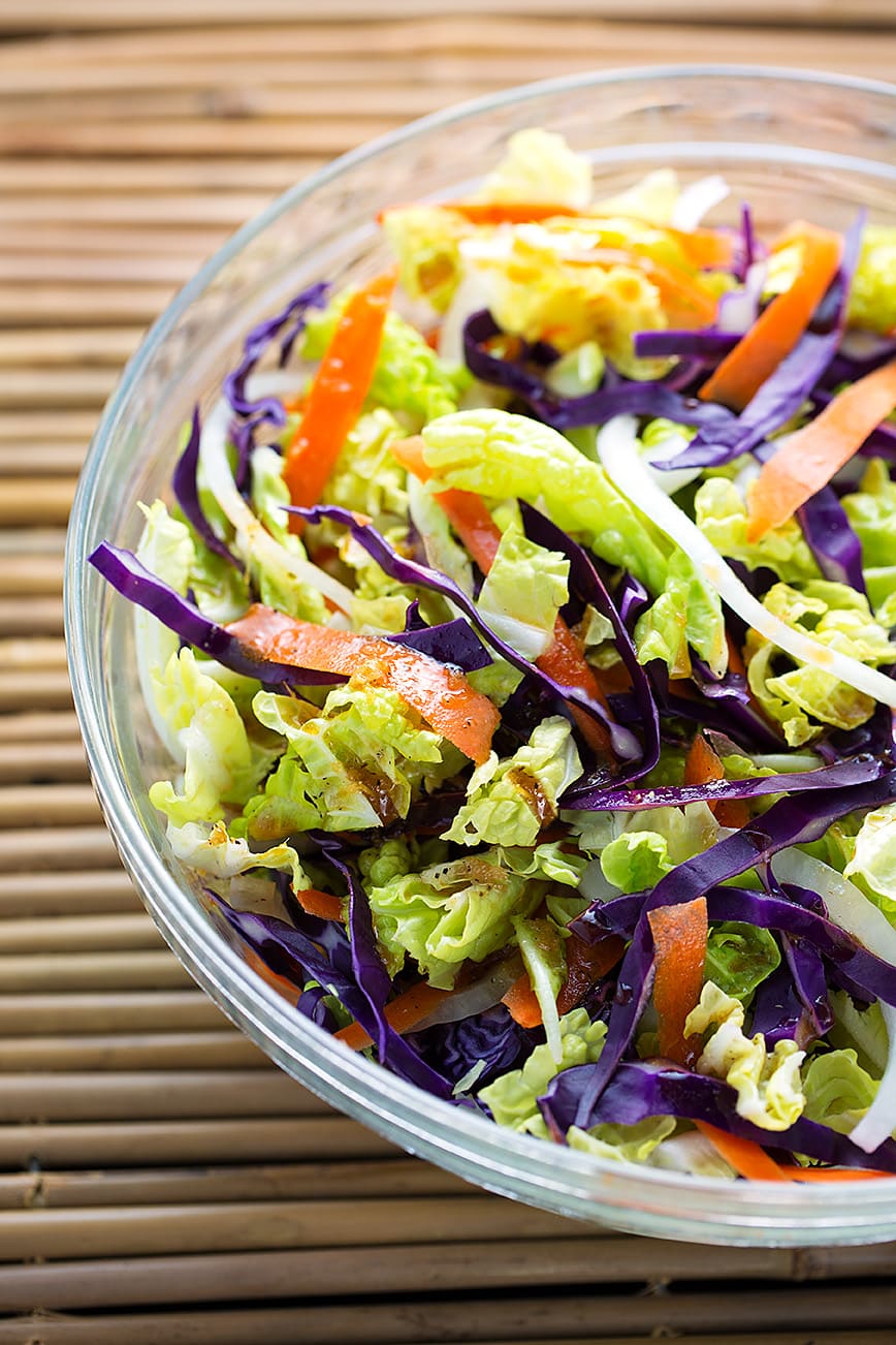 Bowl of Fresh Asian Slaw on a bamboo mat