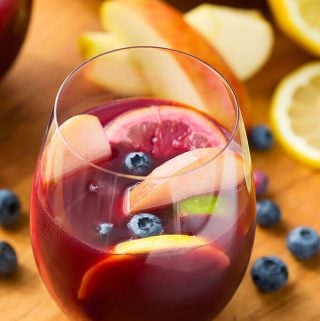 Fruity Red Sangria in a stemless wineglass