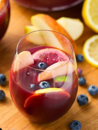 Fruity Red Sangria in a stemless wineglass