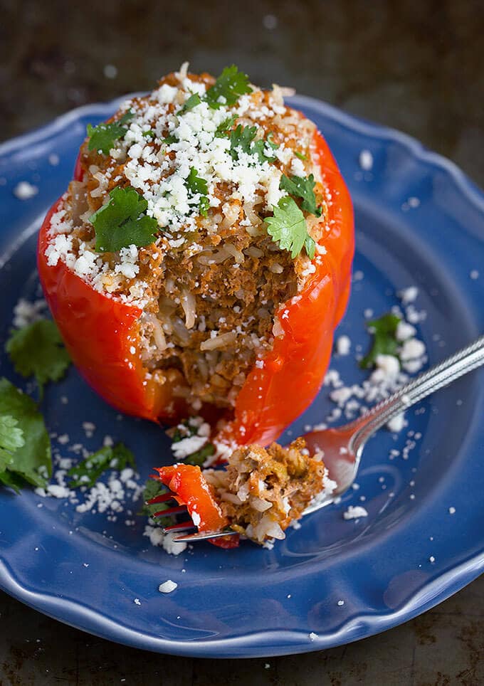 Mexican Stuffed Peppers on blue plate with fork