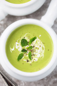 Minty Pea Soup in a small white bowl with handle