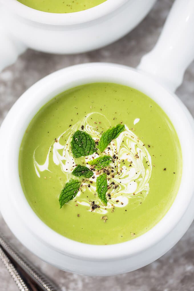 Minty Pea Soup in small white bowl with handle