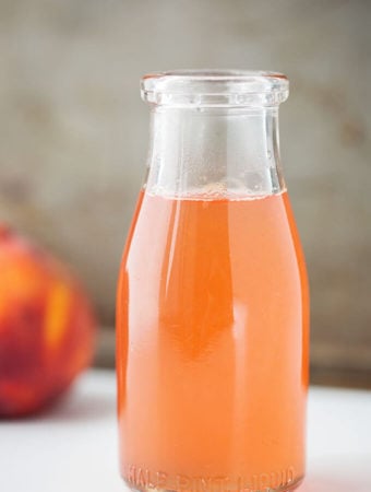 Peach Simple Syrup in glass jar