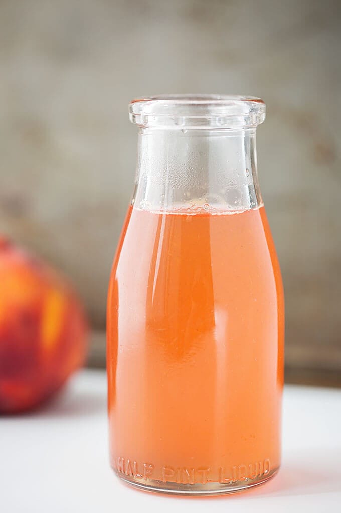 Peach Simple Syrup in glass jar 