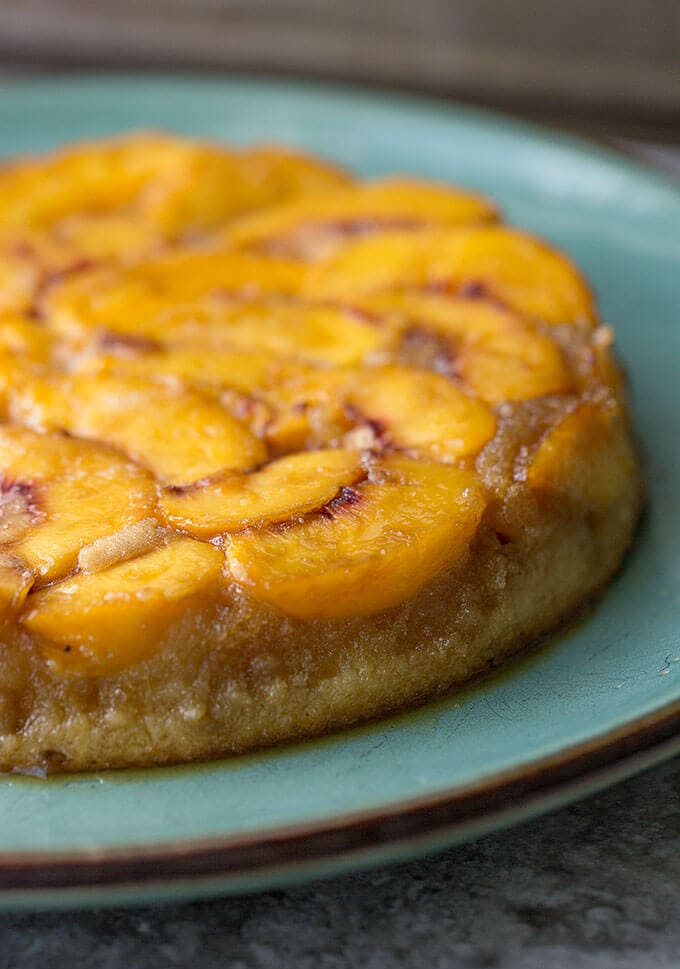Cake with sliced peaches on top