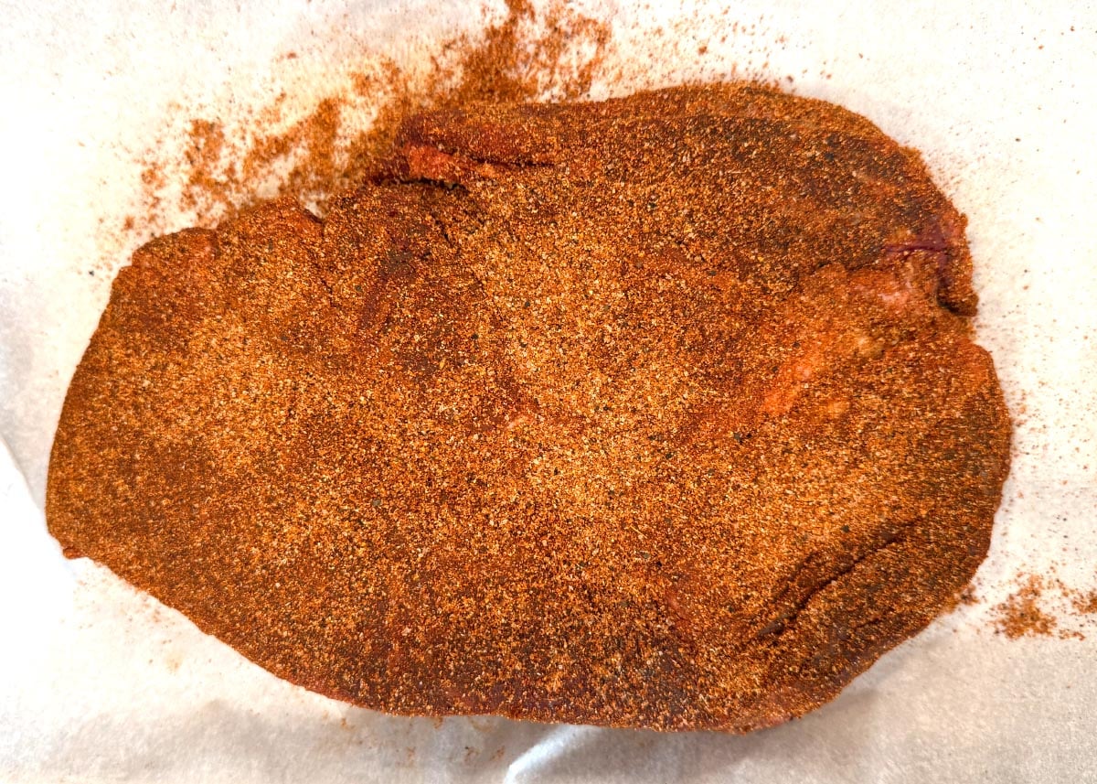 chuck roast coated in ribs dry rub