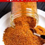 Ribs Spice Rub in a jar on plate.