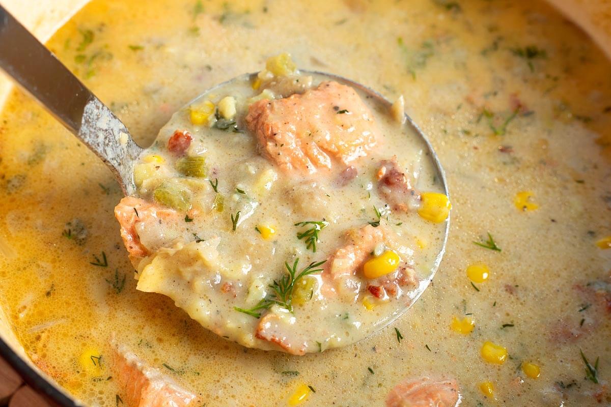 Salmon Chowder in a ladle in a pot
