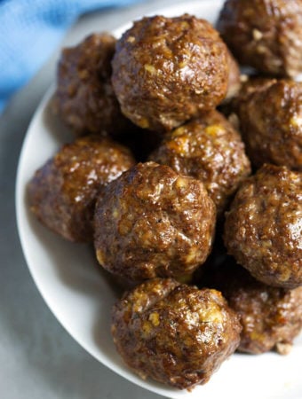 Several Easy Baked Meatballs on a white plate