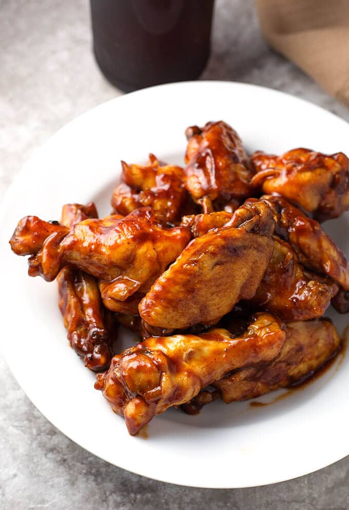 Barbecue chicken wings on white plate