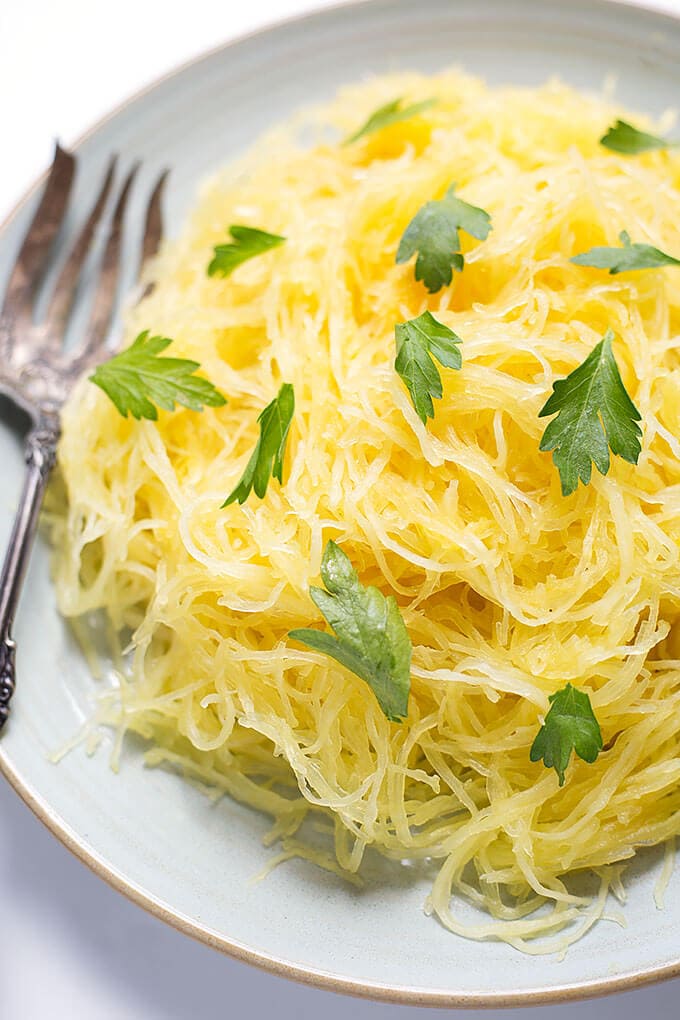 Instant Pot Spaghetti Squash on white plate with fork