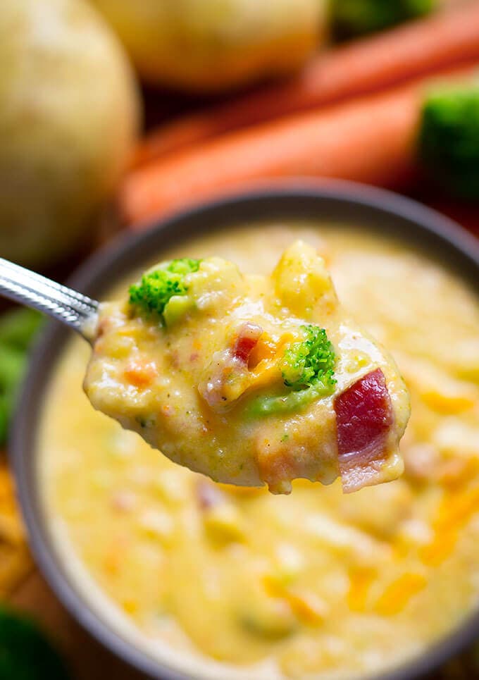 Closeup of spoonful of Loaded Broccoli Cheese & Potato Soup 