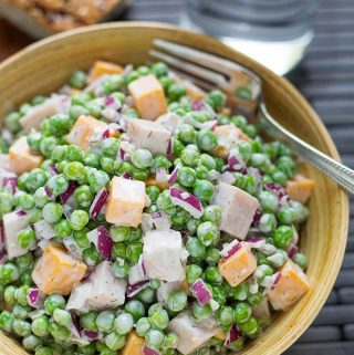 Pea Salad with Smoked Turkey is a tasty side or a main dish pea salad recipe. You can make this a pea salad with bacon, or a pea salad with ham, too. Simply delicious! simplyhappyfoodie.com #peasalad #peasaladrecipe
