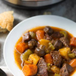 Sandy's Instant Pot Beef Stew is rich, delicious, and easy! No browning required! simplyhappyfoodie.com
