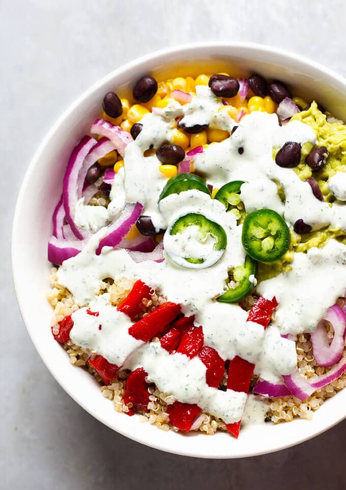 Southwest Quinoa Bowl with Cilantro Dressing in white bowl