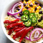 Southwest Quinoa Bowl with Cilantro Dressing in white bowl