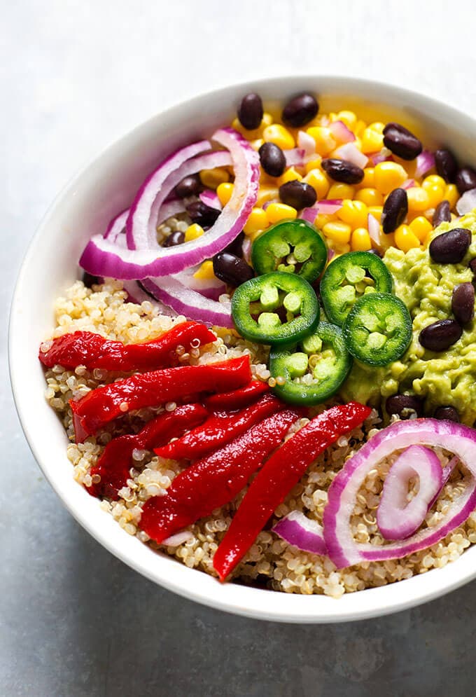 Southwest Quinoa Bowl with Cilantro Dressing in white bowl