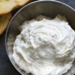 Whipped Feta Spread in a small metal bowl