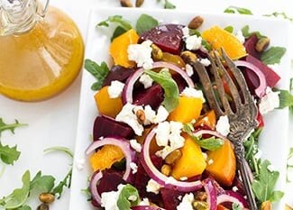 instant pot Beet Salad on a square white plate with fork.