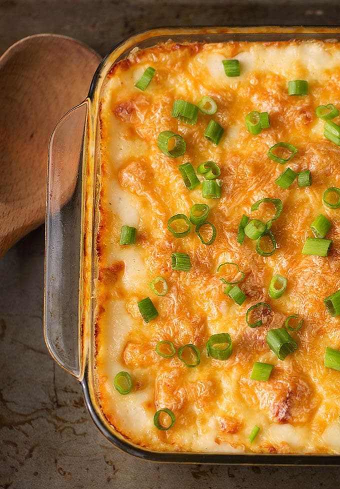 Cheesy Baked Orzo in a glass casserole dish