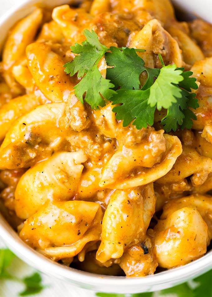 Close up of Cheesy Taco Pasta in a white bowl