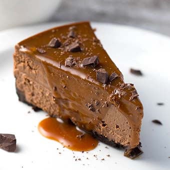 Slice of Instant Pot Chocolate Cheesecake on a white plate