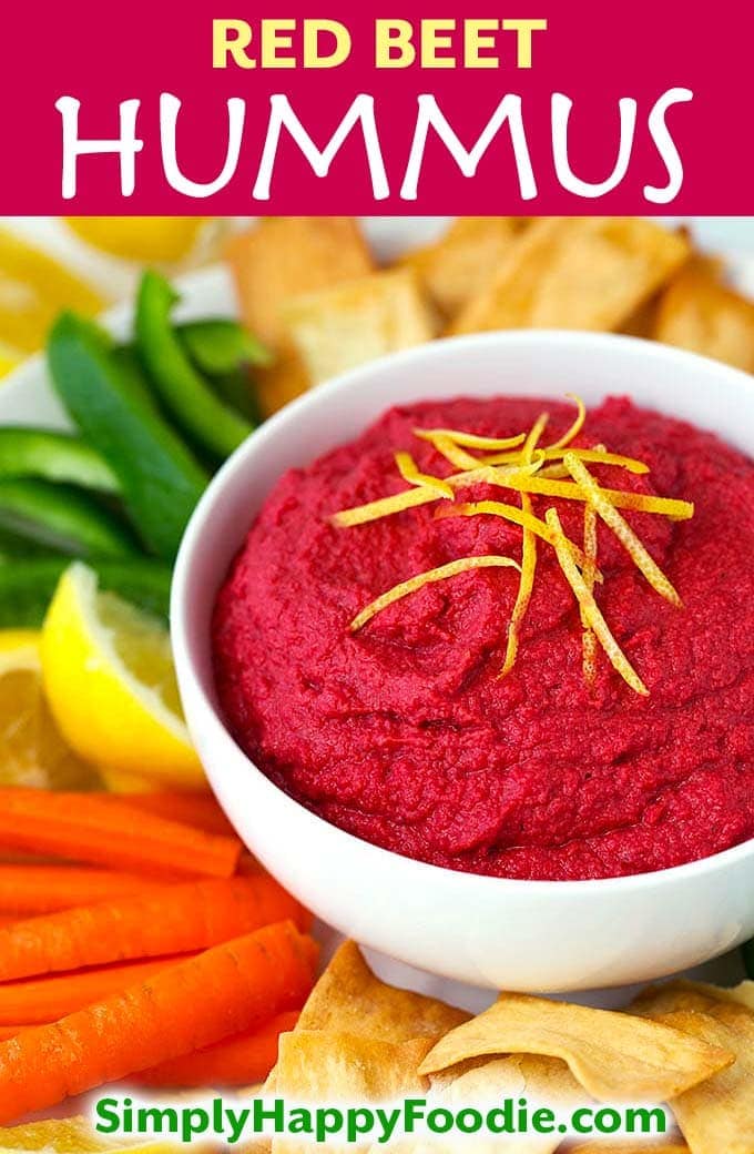 Red Beet Hummus is a sweeter version of the wonderful Classic Hummus. Featuring red beets, garlic, and a small amount of tahini for an earthy flavor. This Red Beet Hummus tastes great on pita chips, carrot sticks, and on a sandwich or wrap! simplyhappyfoodie.com #redbeethummus #beethummusrecipe