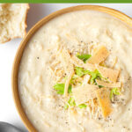 Creamy Cauliflower Soup in brown bowl