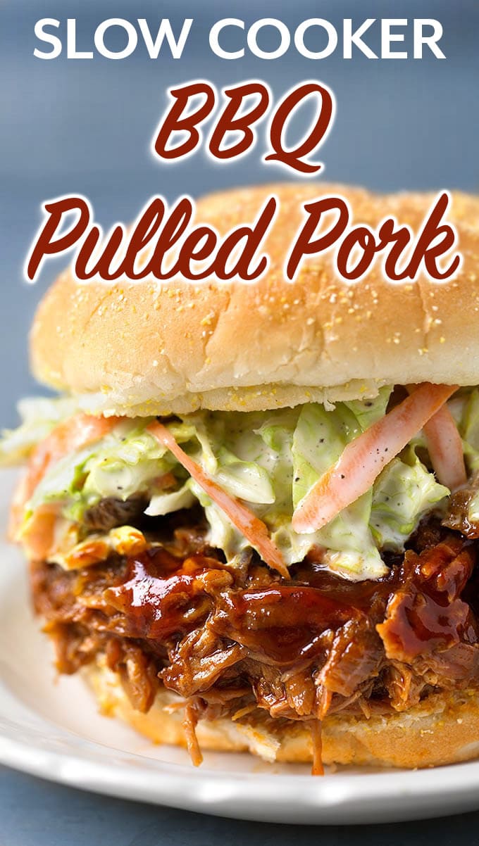 Very tasty Slow Cooker BBQ Pulled Pork will feed the whole family. This crock pot bbq pulled pork is easy to make on a busy day. Just set it and go! simplyhappyfoodie.com #pulledpork #bbqpulledpork #barbecuepulledpork #slowcookerpulledpork #crockpotpulledpork