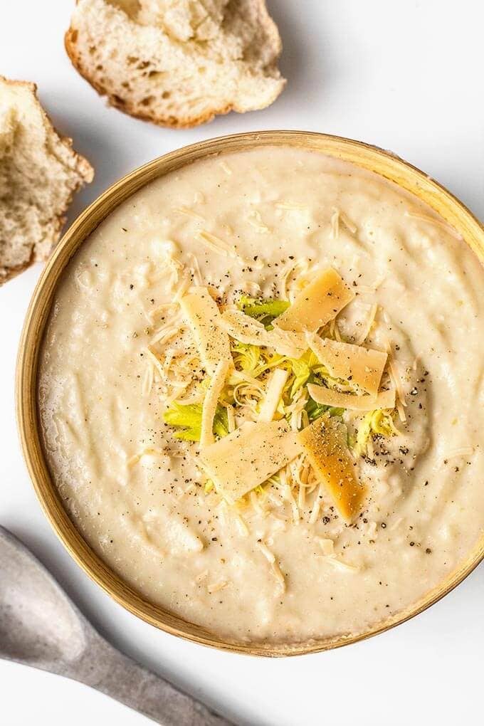 Smoky Creamy Cauliflower Soup is full of flavor and so easy to make! A Fall favorite cauliflower soup! simplyhappyfoodie.com #cauliflowersoup #creamycauliflowersoup