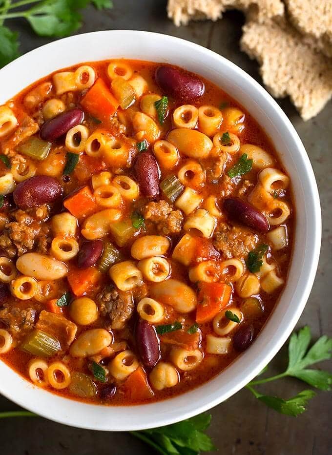 Instant Pot Pasta E Fagioli in white bowl on metal background