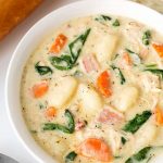 Creamy Chicken Gnocchi Soup is rich and full of Italian flavor! It is easy to make and goes well with crusty bread. simplyhappyfoodie.com #chickengnocchisoup #gnocchi #gnocchisoup