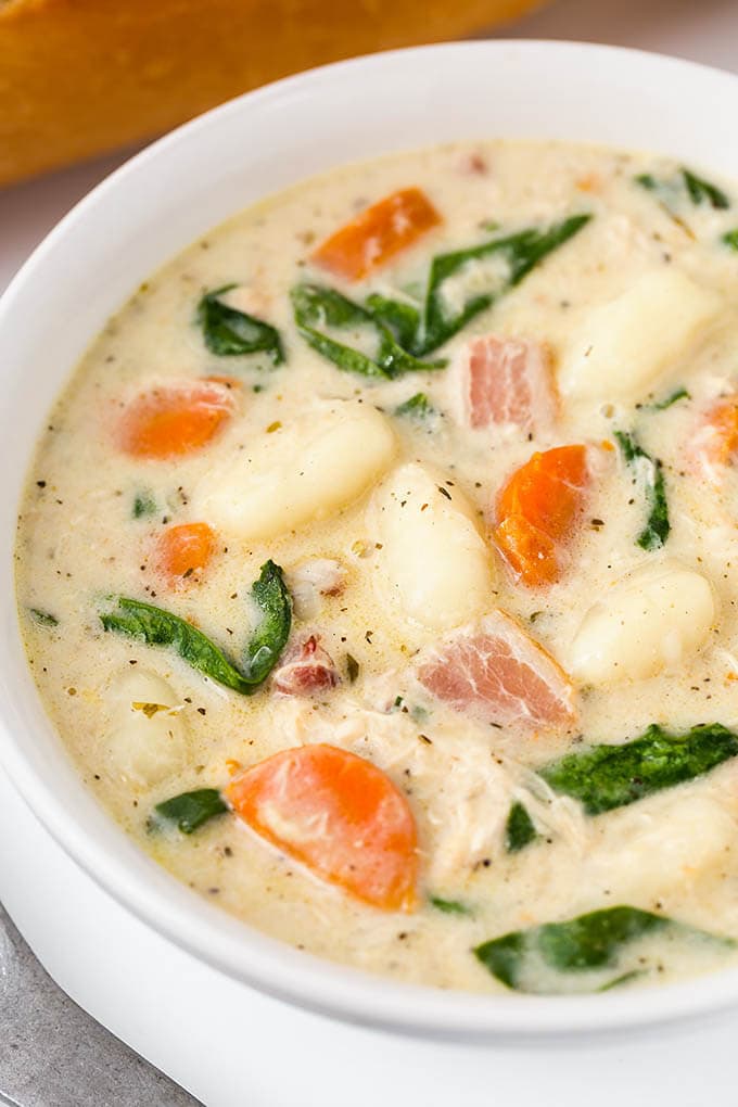 Creamy Chicken Gnocchi Soup in a white bowl