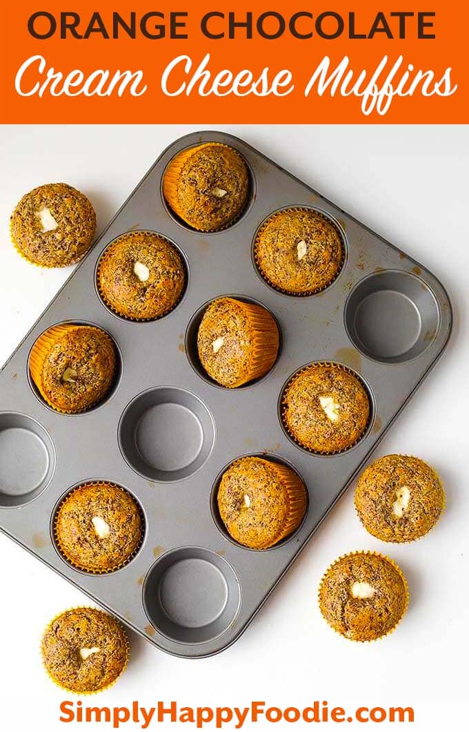 Orange Chocolate Cream Cheese Muffins are a delightful breakfast muffin. A nice chocolate orange muffin to have with tea or coffee. simplyhappyfoodie.com #muffins #orangechocolatemuffins #muffinswithcreamcheese