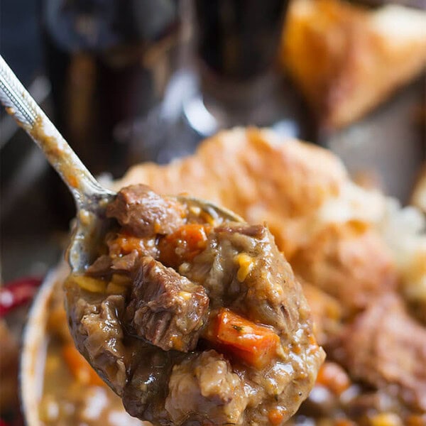 Instant Pot Beef Guinness Stew on a spoon.