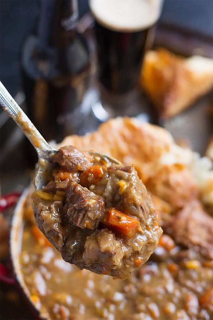 Instant Pot Beef Guinness Stew is rich, flavorful, and much faster to make in your electric pressure cooker than in the oven. A hearty and delicious beef stew. simplyhappyfoodie #instantpotrecipes #instantpotbeefstew #instantpotirishbeefstew #instantpotguinnessstew #pressurecookerbeefstew