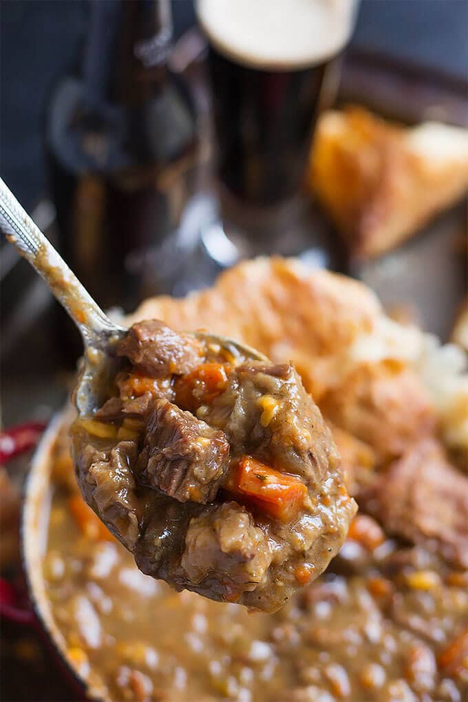 Instant Pot Beef Guinness Stew on a spoon.