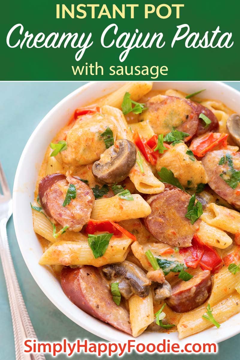 Instant Pot Creamy Cajun Pasta with Sausage is a super flavorful meal with penne pasta, smoky kielbasa, red bell pepper, and a creamy Cajun sauce. Pressure cooker Creamy Cajun Pasta with Sausage is a yummy one pot meal! Instant Pot recipes by simplyhappyfoodie.com #instantpotpasta #instantpotcajunpasta #pressurecookercajunpasta