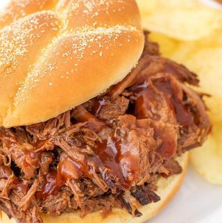 Instant Pot Barbecue Beef is an easy recipe to make, and versatile. Make BBQ beef sandwiches, serve over rice, or on potatoes. Pressure cooker bbq beef bottom round roast. simplyhappyfoodie.com #instantpotrecipes #instantpotbbqbeef #instantpotroast #pressurecookerroast