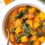 Instant Pot Sweet Potato and Kale Soup is a hearty, vegetarian and vegan soup with a ton of flavor. It is easy to make, and so very delicious, and a very healthy pressure cooker sweet potato kale soup! simplyhappyfoodie.com #instantpotrecipes #instantpotsweetpotatokalesoup #instantpotsoup #pressurecookersoup #instantpotvegan