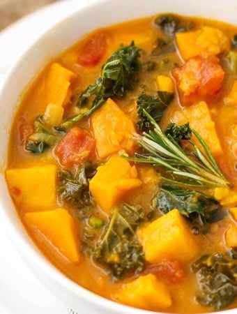 Close up of Sweet Potato Kale Soup in a white bowl