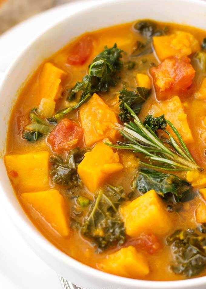 Close up of Sweet Potato Kale Soup in a white bowl