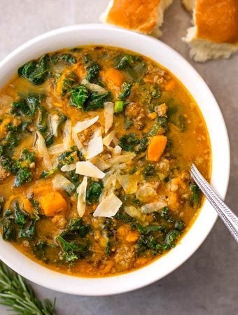 Instant Pot Sweet Potato Sausage and Kale Soup is a hearty, but not heavy soup with a ton of flavor. It is easy to make, and so very delicious, and even healthy! simplyhappyfoodie.com #instantpotrecipes #instantpotsweetpotatosausagekalesoup #instantpotsoup #pressurecookersoup