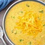 Instant Pot Broccoli Cheddar Soup is thick and cheesy with the right amount of broccoli. This pressure cooker broccoli cheddar soup is so delicious, you might need to make a double batch! simplyhappyfoodie.com #instantpotrecipes #instantpotsoup #instantpotbroccolicheddar #pressurecookerbroccolicheddarsoup