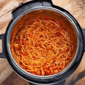 Instant Pot Spaghetti in pot with spoon.